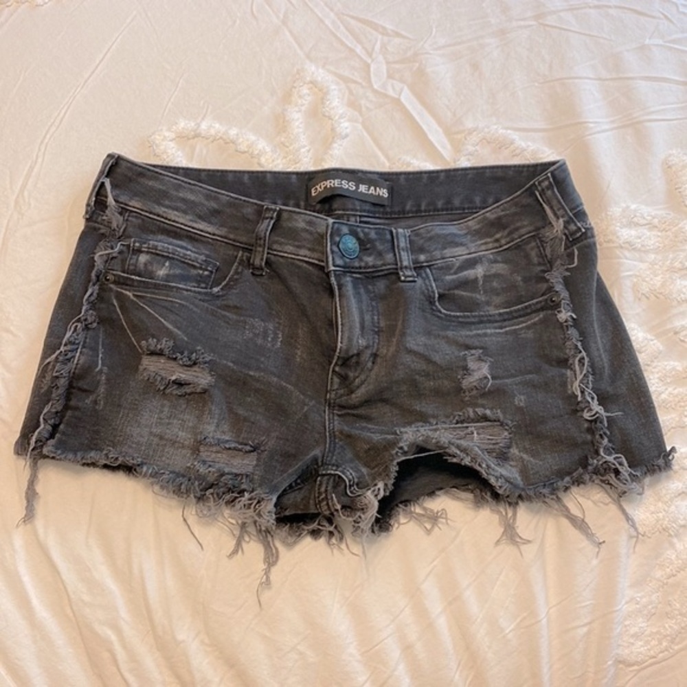 Express black Jean shorts with rips/frayed hems size 6